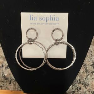 New with tags, lia sophia hoop earrings. Post back.